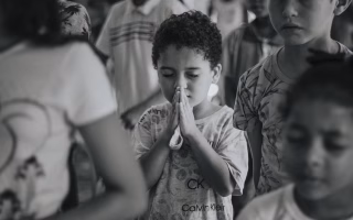 Student praying in school