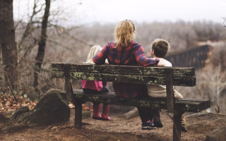 actively listening and smiling during a meaningful conversation.
