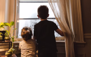 Parent rushing a child through a morning routine, emphasizing the silent emotional strain of a fast-paced daily schedule.