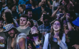 Teens partying at a festival, possibly in the wrong crowd