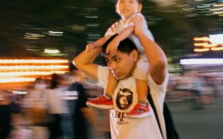 dad with child at the fair