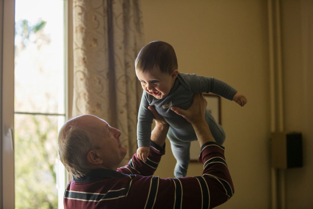 dad holding baby