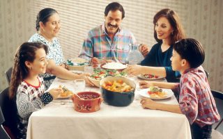 family eating dinner at the table