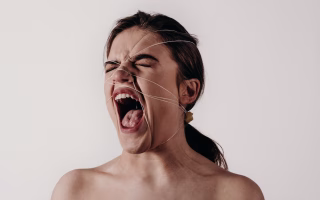Parent yelling while child looks upset