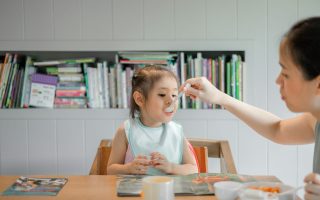 child eating food