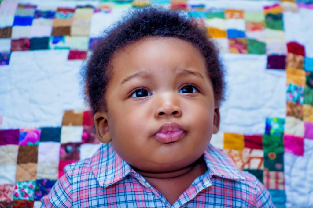 child looking hopeful