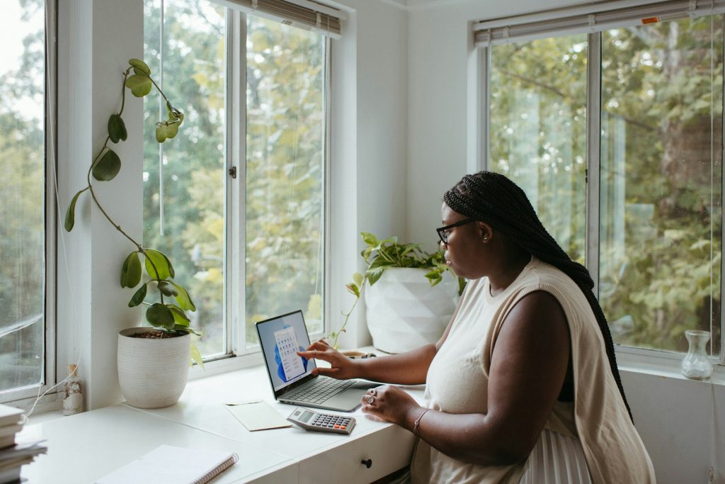 woman working on laptop in home office