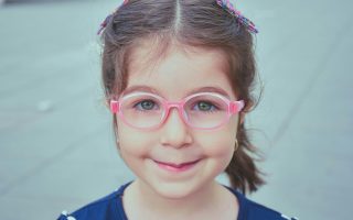 child with glasses