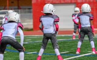 The Hidden Risks of Youth Tackle Sports Parents Need to Know