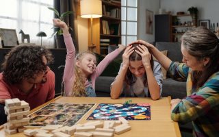 Ways Parents Can Sneak in Money Lessons at Family Game Night