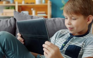 Child On Tablet