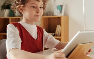 Kid On Tablet
