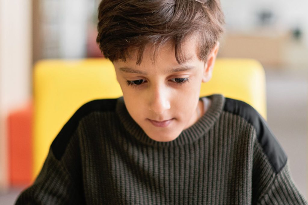 Young Boy In Class