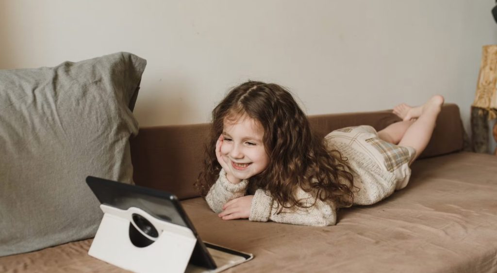 Young Girl On Tablet