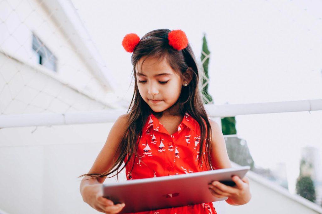Young Girl On Tablet