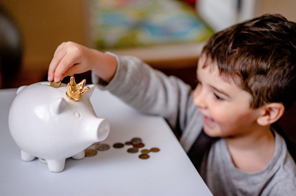 Young Boy Counting Coins