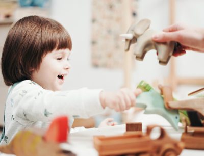 Child Playing With Toys