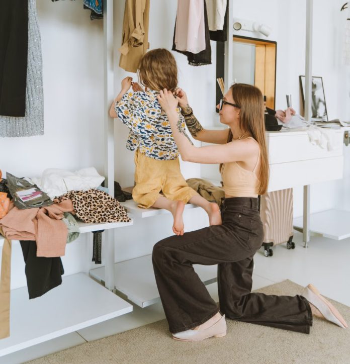 Mother Dressing Daughter