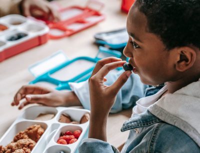 Young Boy Eating Lunch