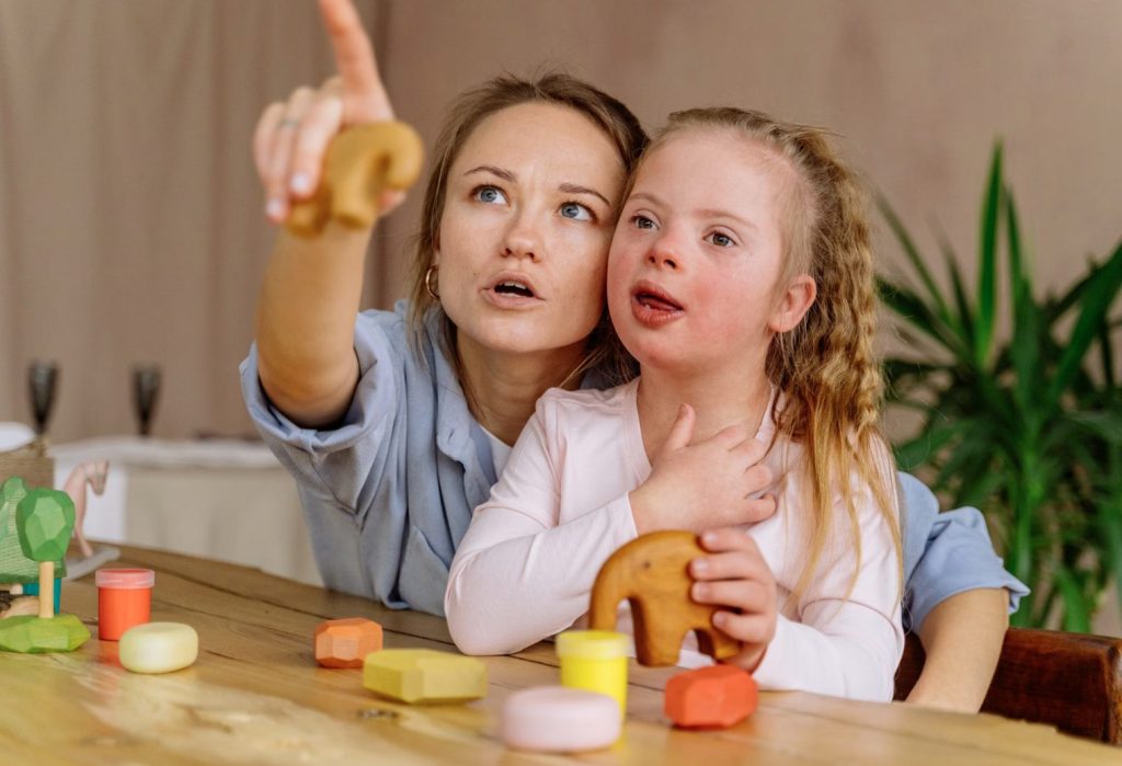 Down Syndrome Child With Mom