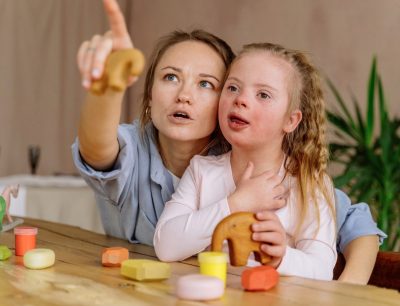 Down Syndrome Child With Mom