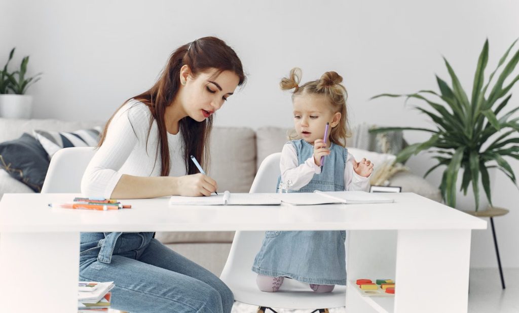 Mother And Daughter At Home