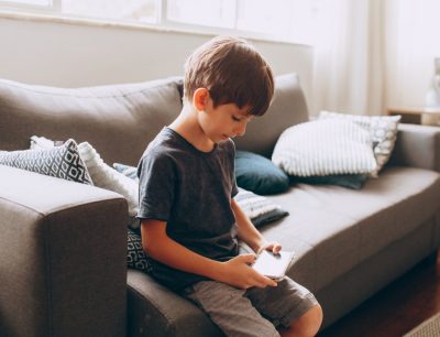 Young Boy Using Smartphone